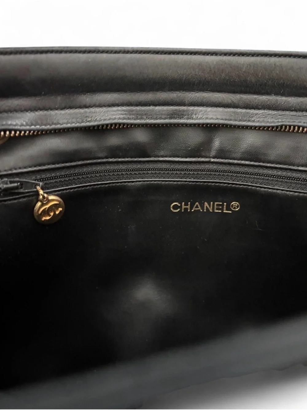 CHANEL Black Quilted Lambskin Leather Purse with Gold Hardware